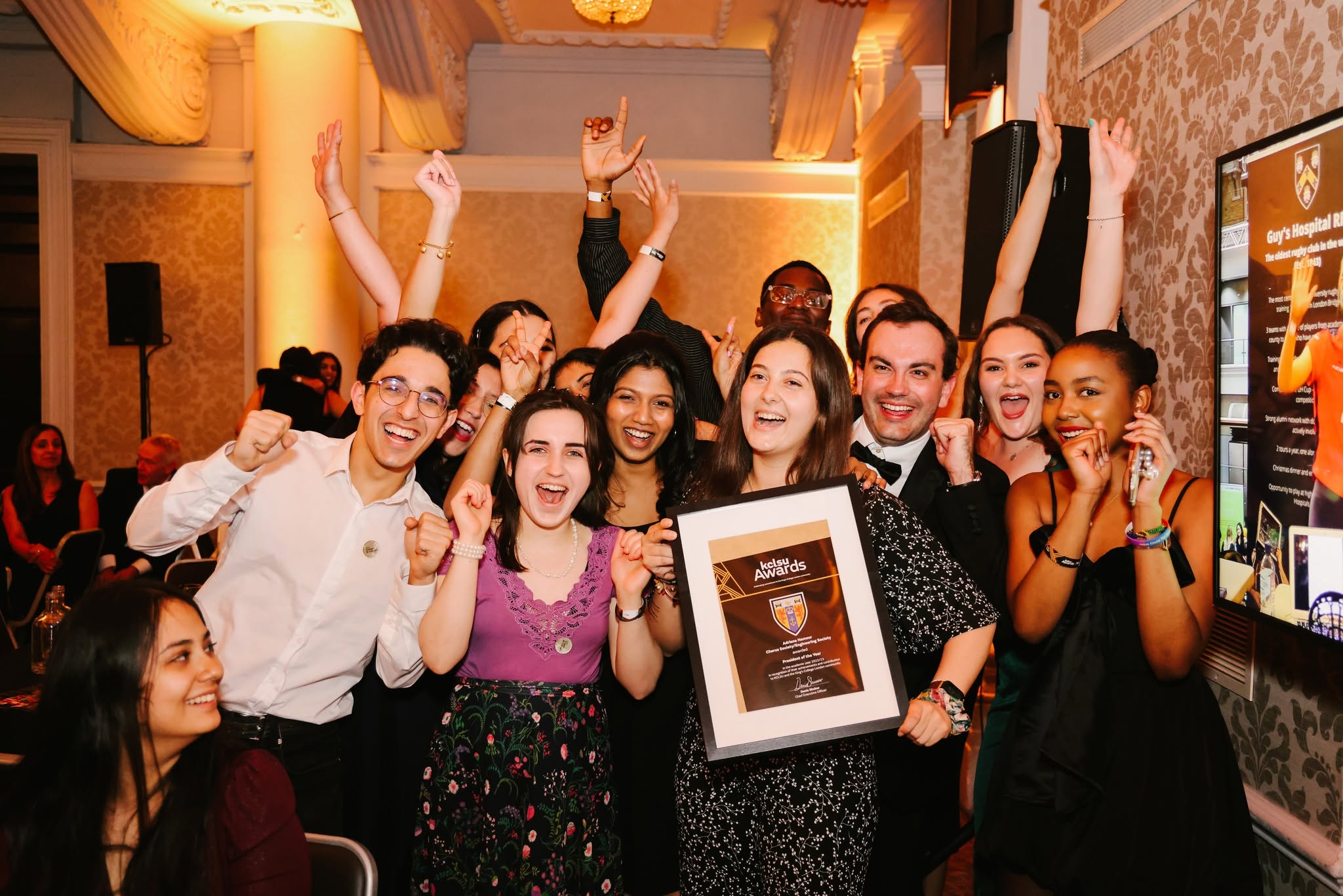 Adriana celebrating her KCLSU President of the Year award with fellow students